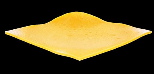 Premium cheddar cheese slice