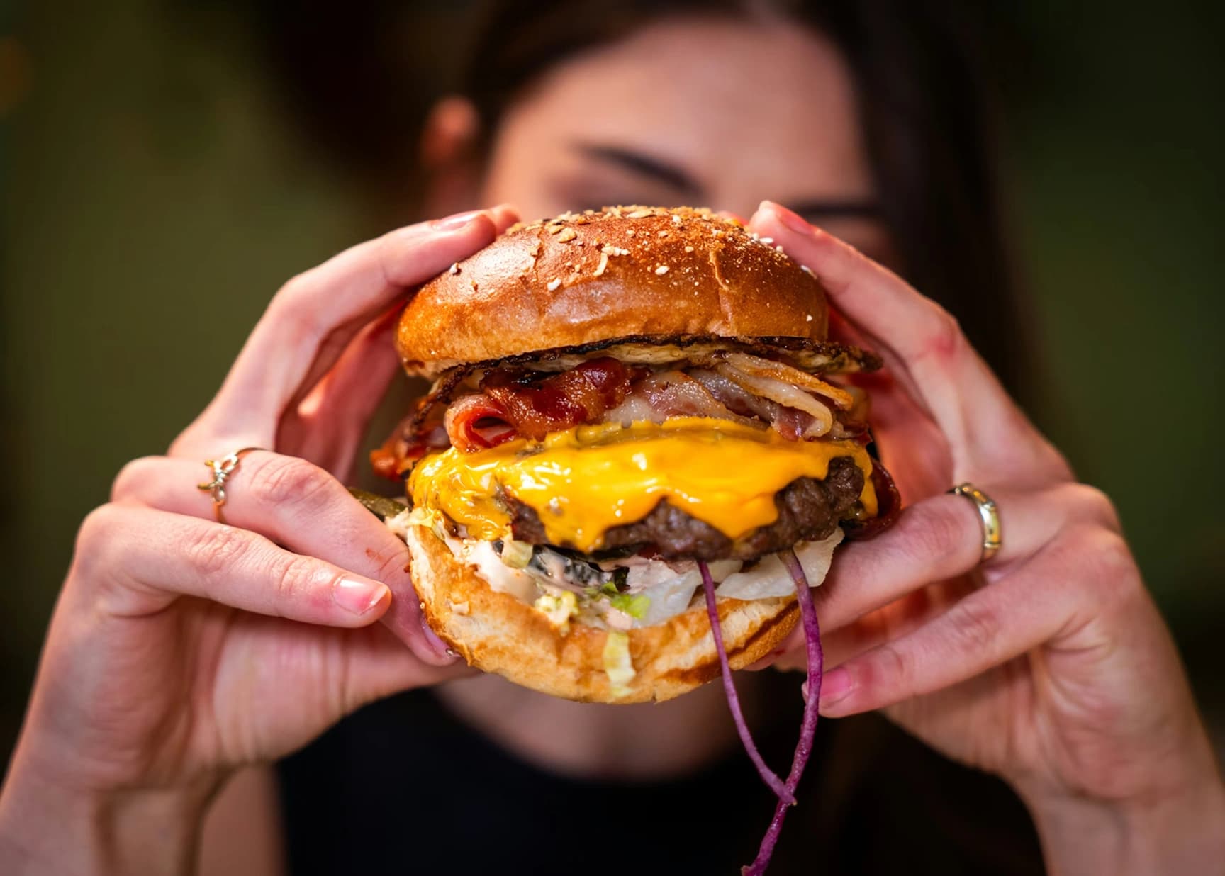ORAZEN Signature Cheesy Burger with dripping cheese
