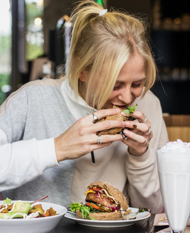 Premium smashed burger on a wooden board